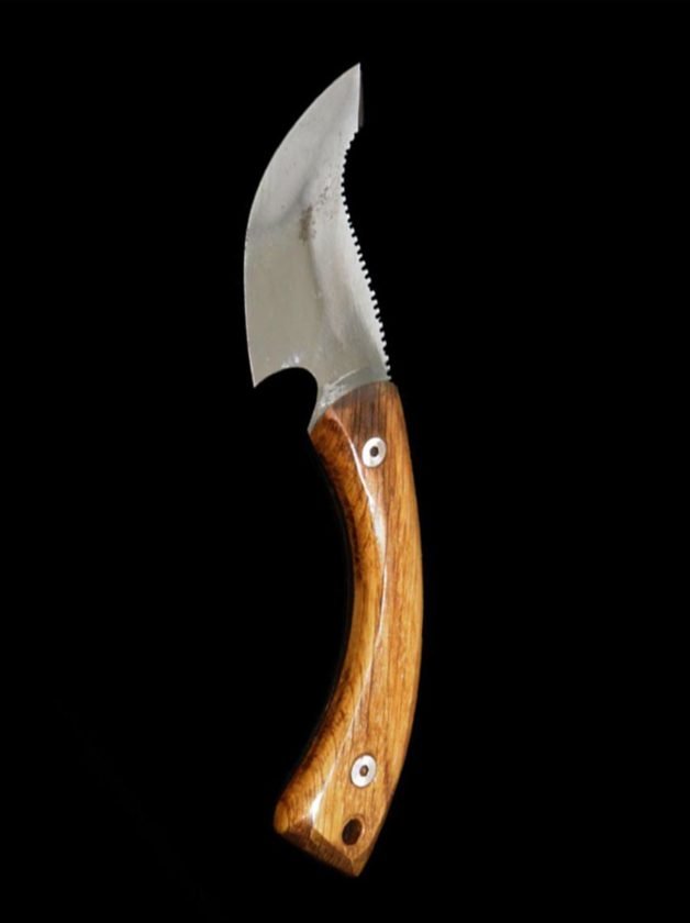 Survival knife with wooden handle Survival knife with wooden handle